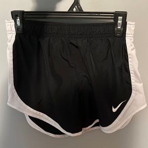 Nike Dri-Fit athletic shorts. Black, size medium. Mesh on sides. No pockets